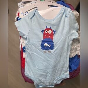 New in package 3 pack of baby monster body suits